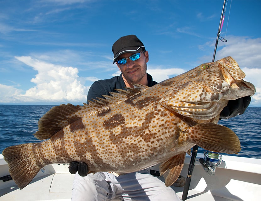 Man holding large fish