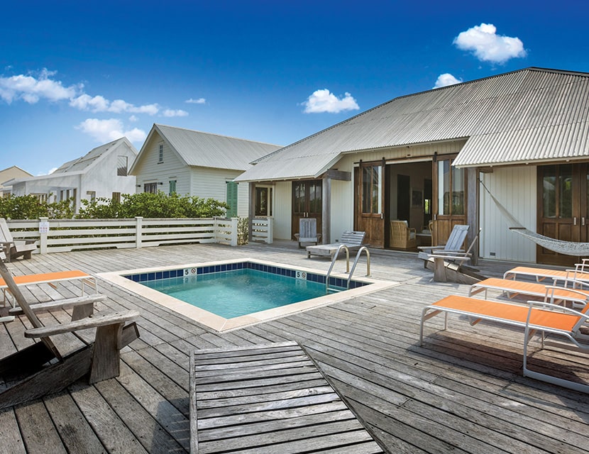 Exterior shot showing pool at the family cottage