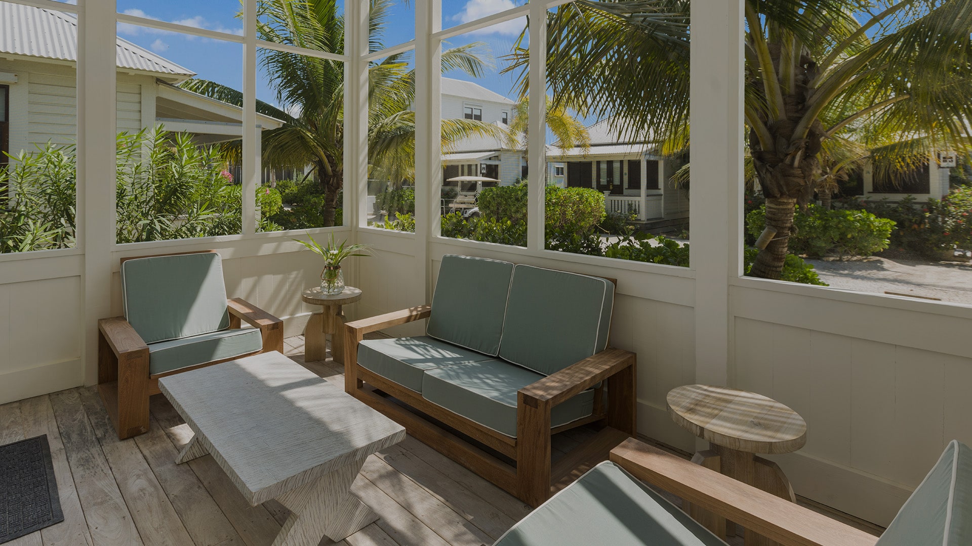 Screened in porch of the lower keeping suite