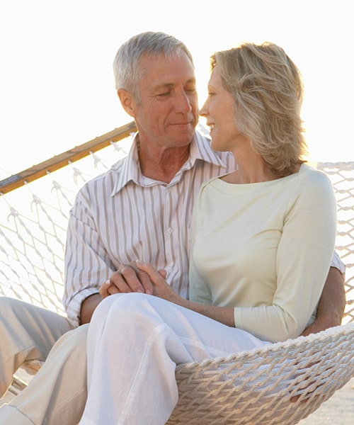 Mature couple in hammock