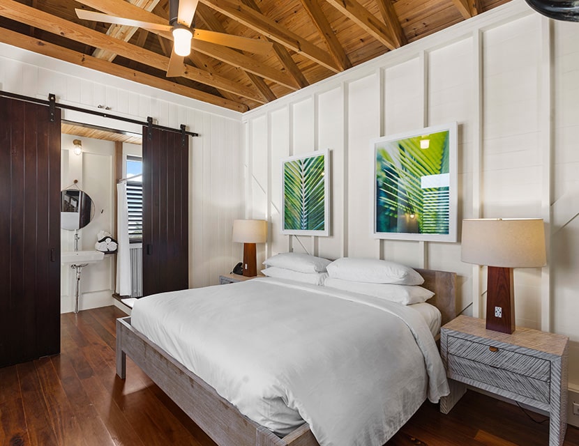 Bed in the Upper Keeping Suite at Mahogany Bay Resort & Beach Club