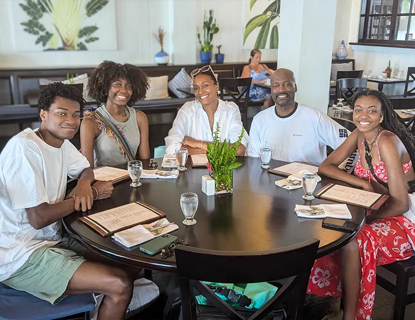 Family eating at Berandah fine dining restaurant Mahogany Bay Resort San Pedro Ambergris Caye Belize